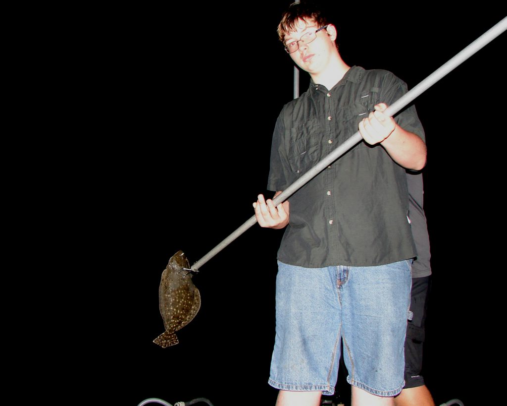 Garritt Jernigan with flounder